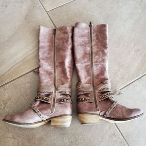 Womens zip up brown boots.